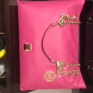 Love Maschino hot pink and gold tote.
